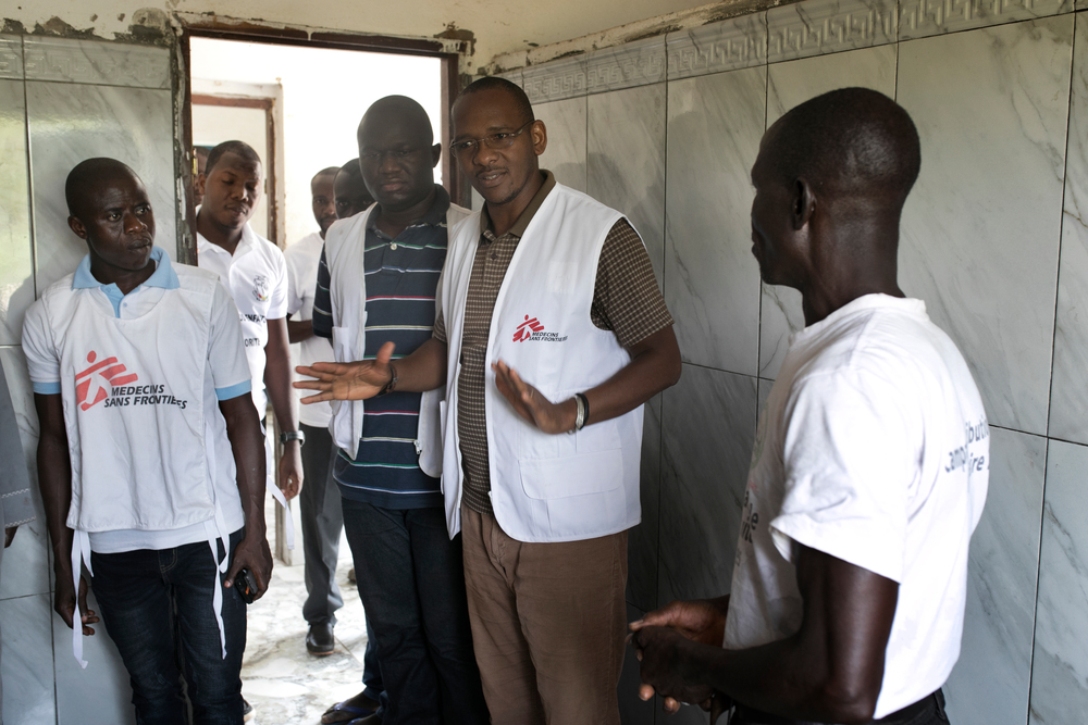 Dr. Ibrahim Diallo, MSF head of mission in Guinea, visits health posts in Cissella in March to prepare in for malaria season.