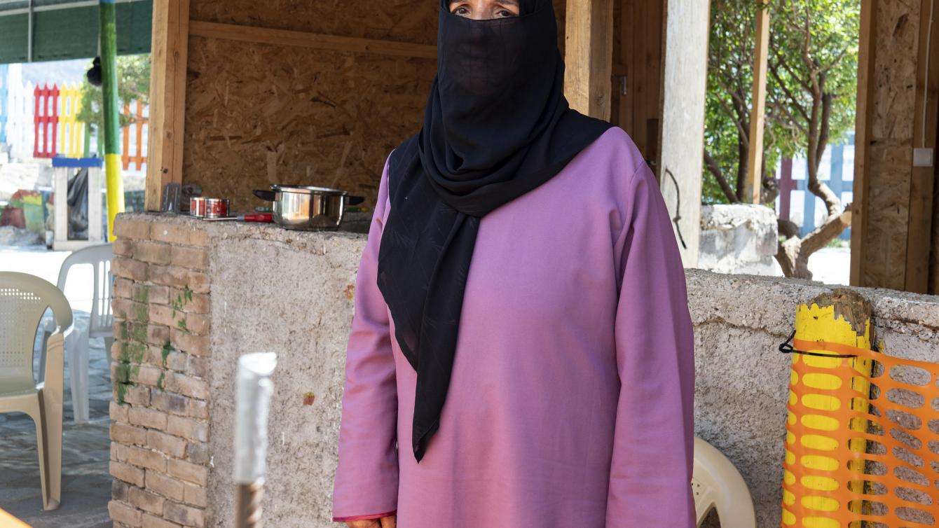 Amira, 62, is from Jabab, a Syrian village in Al-Sanamayn District, Daraa, southwestern Syria. Her husband was killed by armed men in Syria and two of her three sons were severely injured by shrapnel. Amira came to Samos with her daughter-in-law and her youngest son, 23, in December 2019 hoping to be reunited with her other two  sons who were sent to Germany from Greece for medical treatment.   However, Amira is still trapped in Samos and has not seen her sons in Testimony from Vathy Camp. Samos - July 2020
