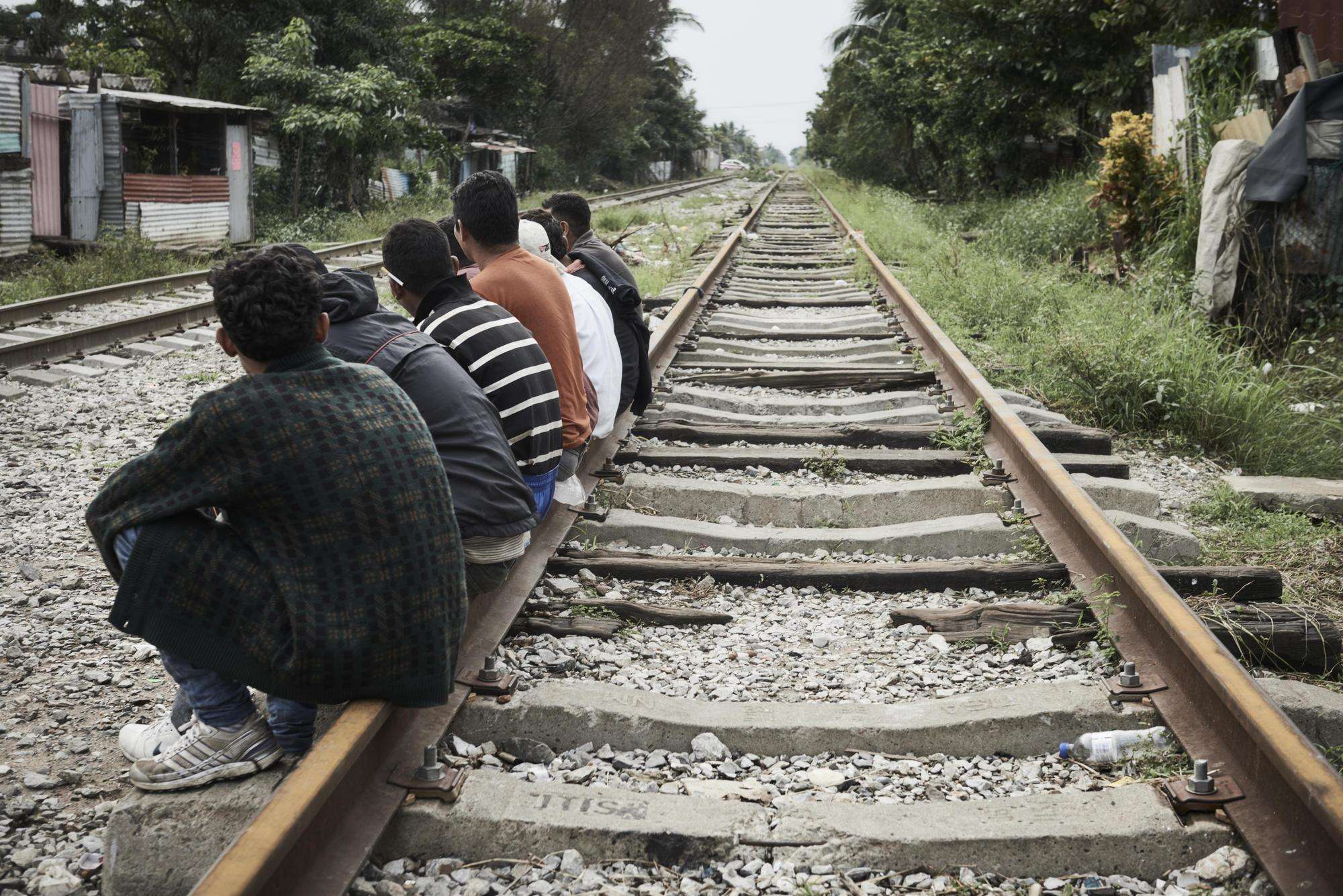 Migrants stop to rest in Coatzacoalcos, a port city in the state of Veracruz. 