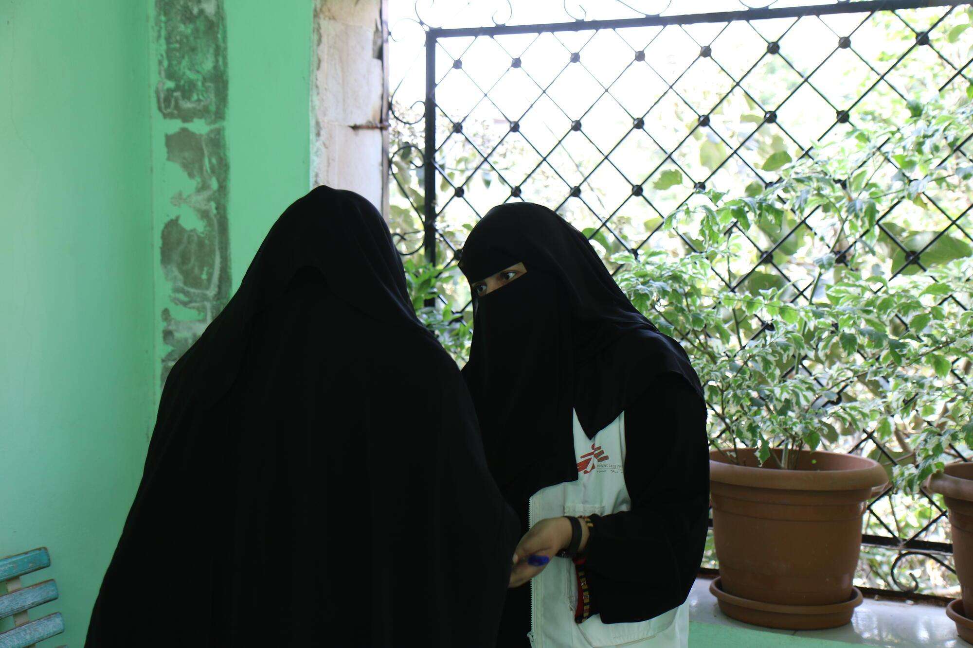 MSF psychologist counsels a patient at the mental health clinic supported by MSF at Al-Gamhouri Hospital in Hajjah. Yemen