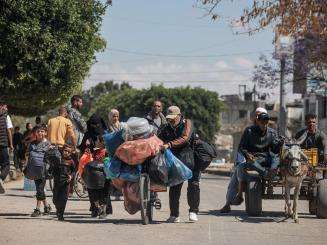 Displaced Palestinians flee Rafah, southern Gaza.