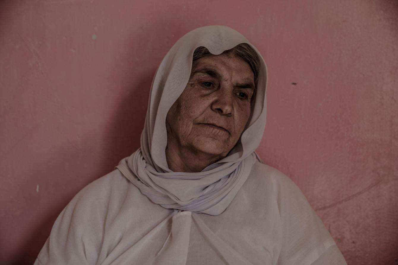 Halo Khalaf, 66, poses in her house in Sinuni on September 2nd, 2019.