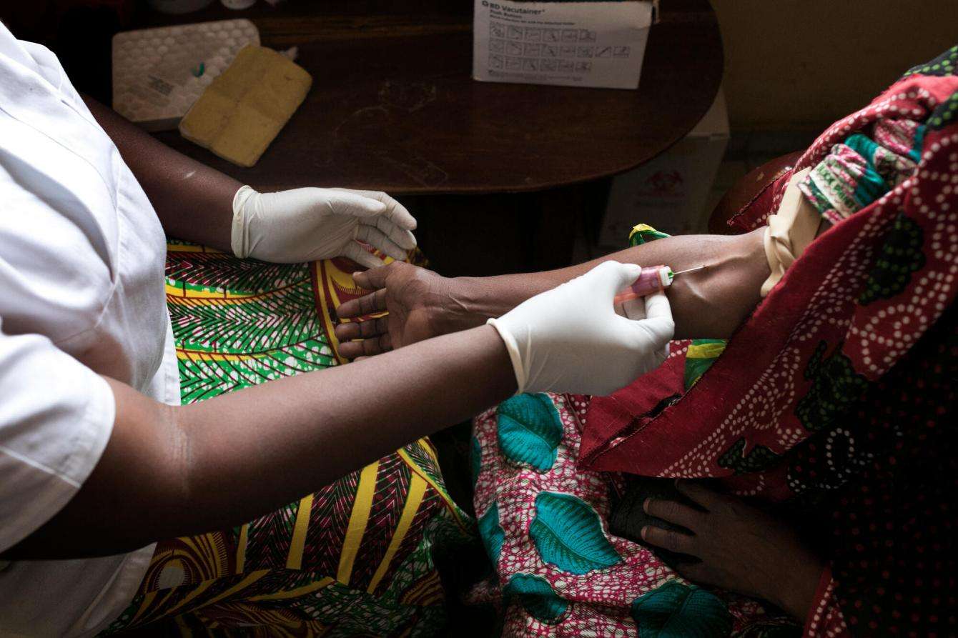 A woman is tested to ensure her ART treatment is working for her HIV/AIDS.